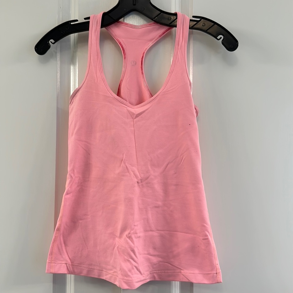 Lululemon peach tank top. Cropped length. Size 4